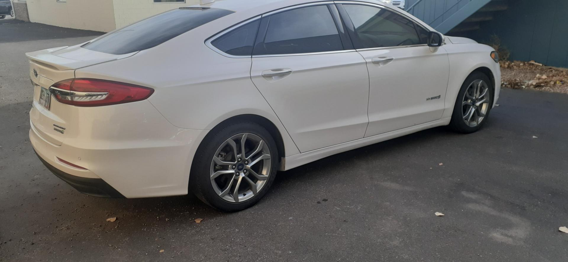 2019 Ford Fusion Hybrid Titanium (3FA6P0RU3KR) with an 2.0L L4 DOHC 16V HYBRID engine, CVT transmission, located at 2015 Cambell Street, Rapid City, SD, 57701, (605) 342-8326, 44.066433, -103.191772 - CARFAX AVAILABLE - Photo#8